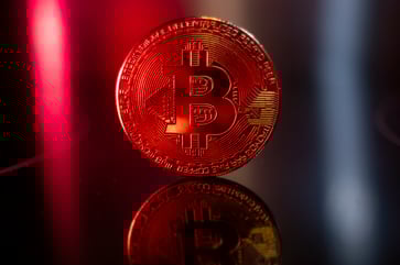 Bitcoin falls below $98,000 due to Treasury yields increasing pressure on risk assets.