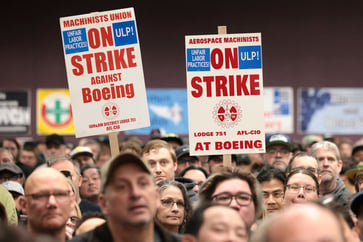 Boeing machinists reject new labor contract, prolonging their strike beyond 5 weeks.