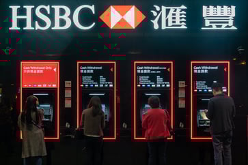 HSBC reports a record annual profit, but experiences a write-down on China, causing shares to fall 7%.