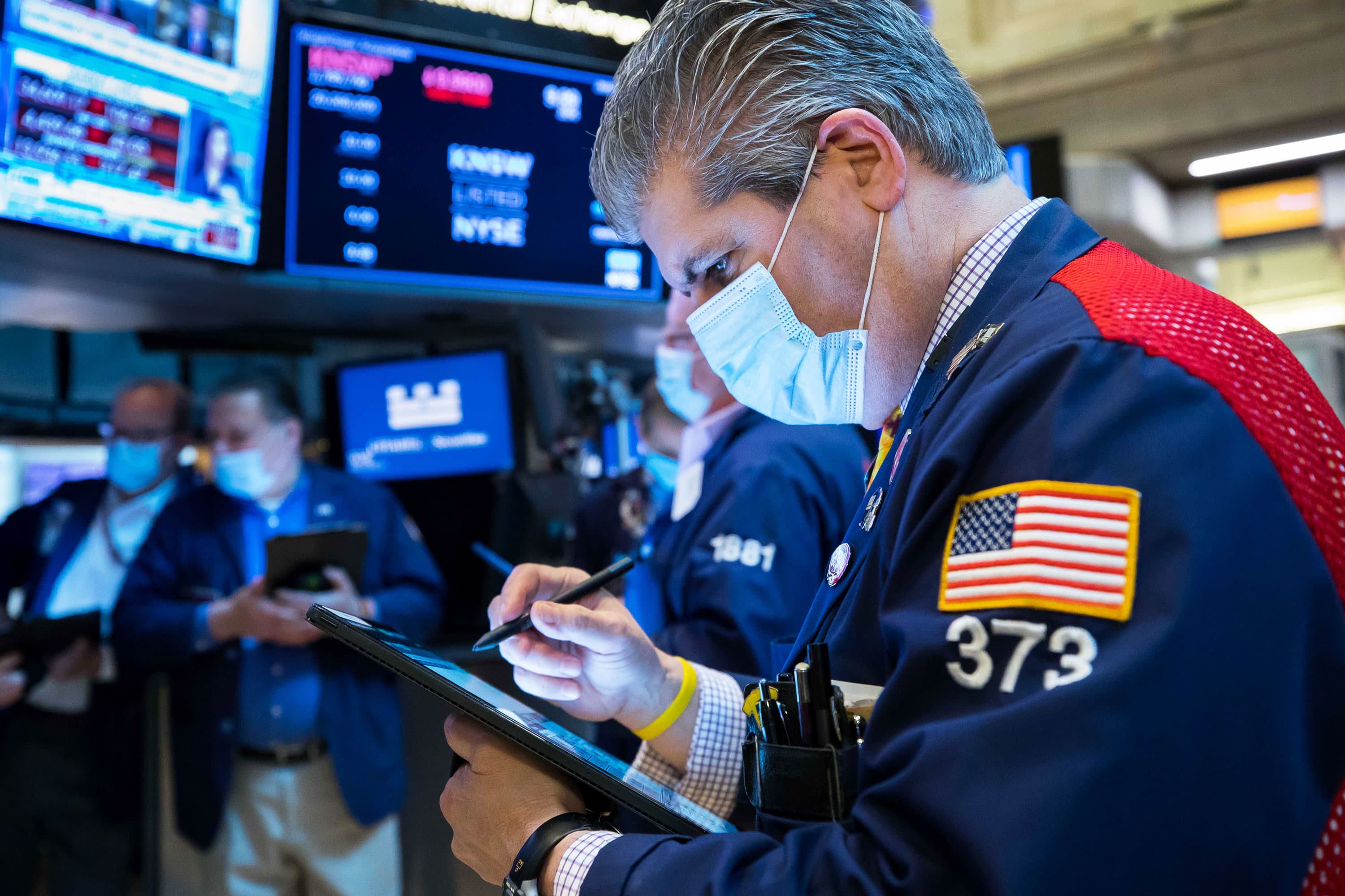Earnings headwinds and a compressed P/E ratio pose challenges for stocks.