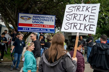 Boeing employees resoundingly reject proposed contract, plan to go on strike.