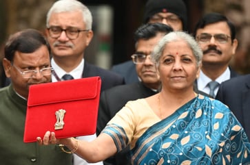 India aims to reduce its fiscal deficit to 5.1% in 2025 while increasing infrastructure spending.