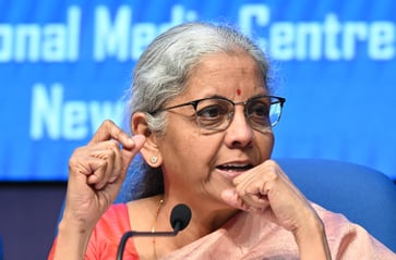 India's finance minister reports that exports are increasing in an uncertain global market.