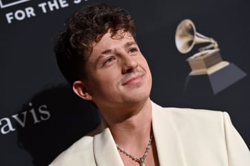 Charlie Puth missed college classes to pursue record label meetings, and the 'hustle days' ultimately led him to secure a deal, according to him.