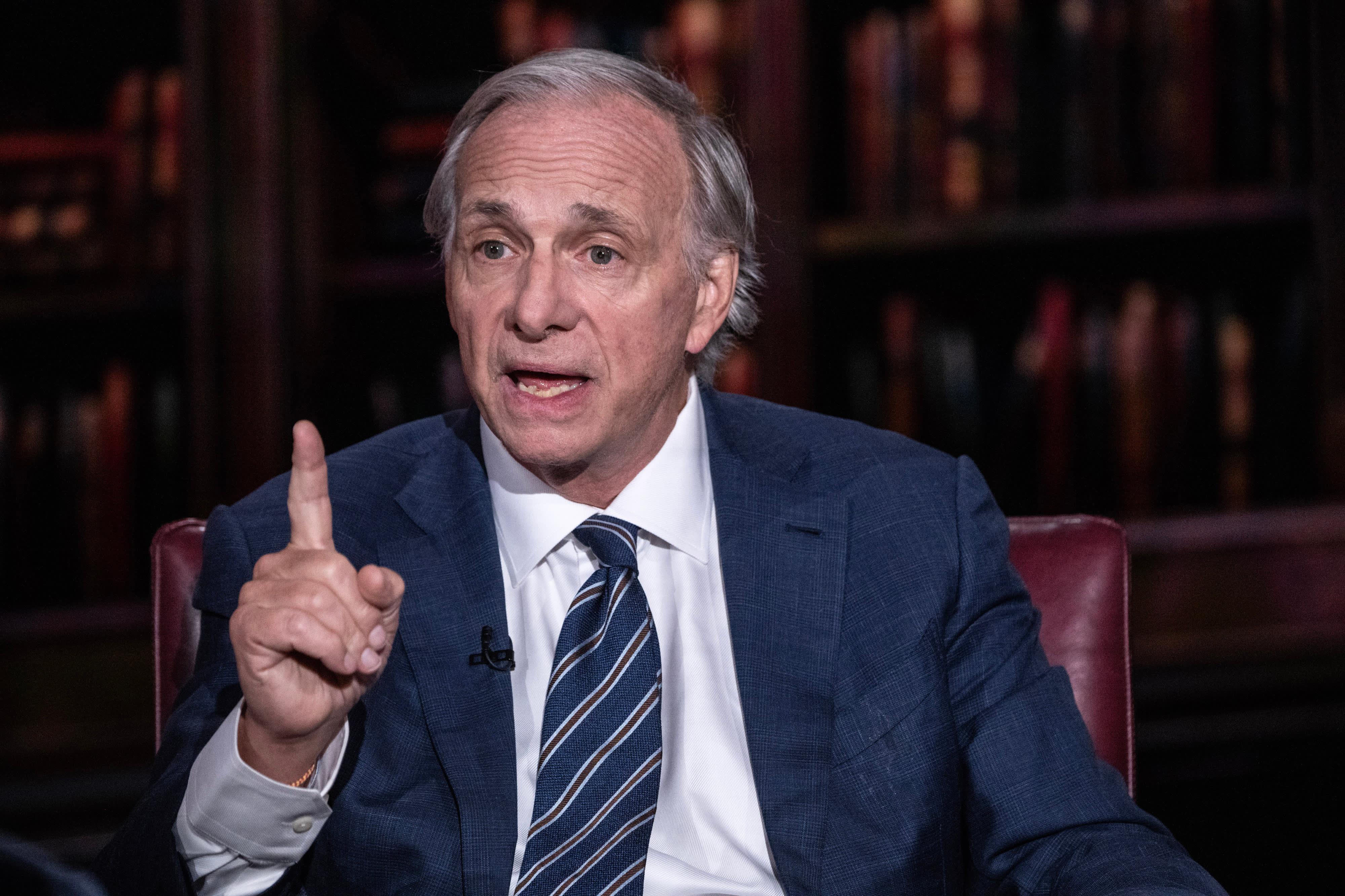 Ray Dalio suggests that China needs to implement a "beautiful deleveraging" to prevent a debt crisis, according to a report.