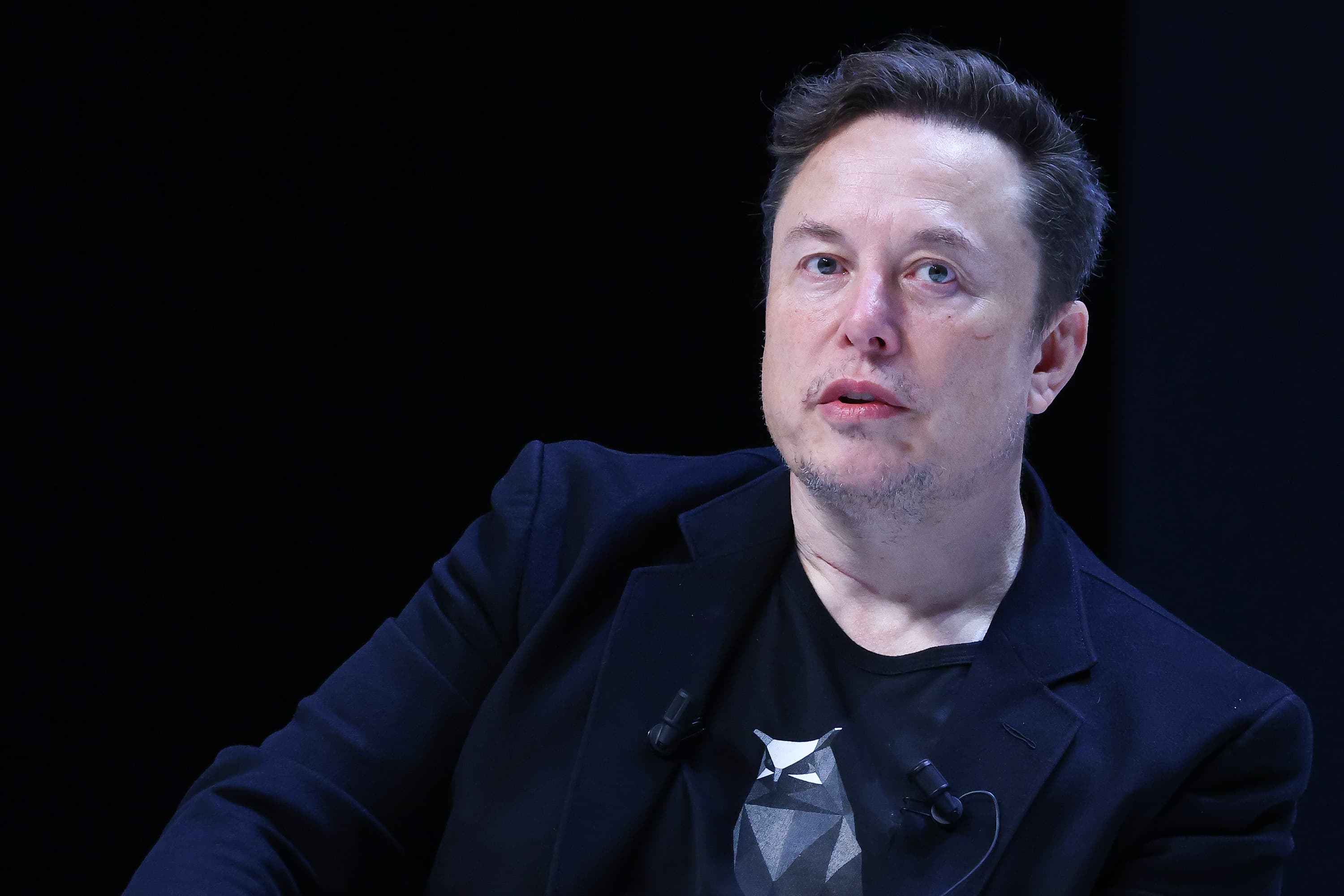 Elon Musk removes X post about Biden, Harris assassination threats after criticism.