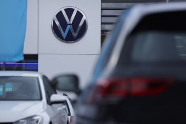 Union reports that Volkswagen is considering layoffs and 10% pay cuts as part of plans to shut down German plants.