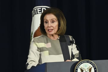 Nancy Pelosi sustains injury while in Luxembourg and is subsequently hospitalized.