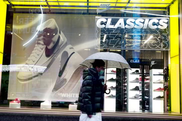 Sales growth at Nike is attributed to North American demand, but the company has delayed its outlook due to global unrest.