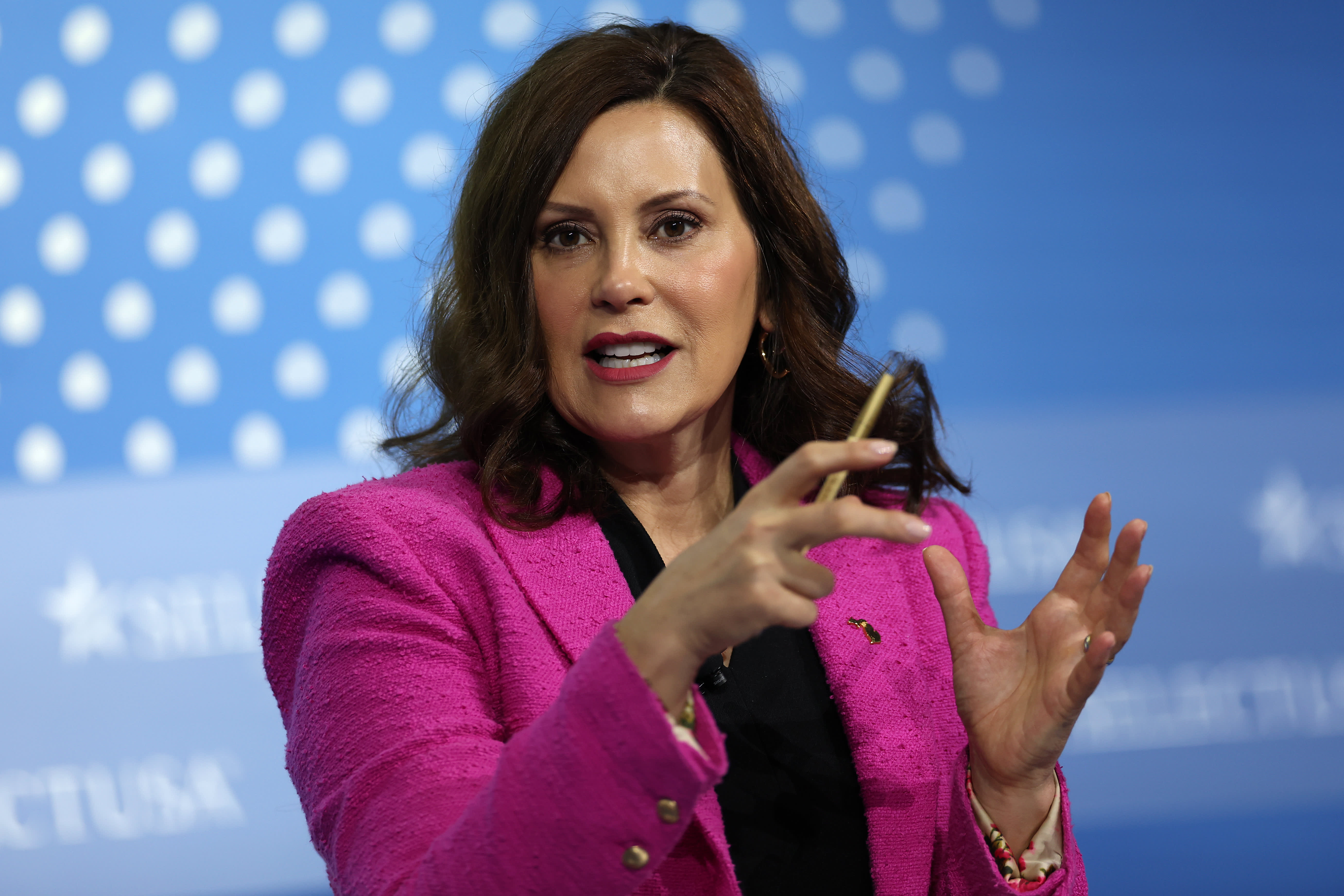 Gretchen Whitmer, Michigan Governor, acknowledges the influence of politics on electric vehicle adoption.