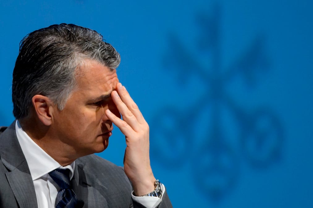 New Swiss bank laws may hinder UBS's challenge against Wall Street giants.