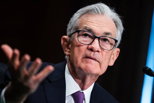 According to a CNBC survey, the Fed may not cut rates as many times as anticipated due to the economy's continued growth.