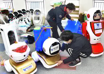 Amid the coronavirus outbreak, the race to implement robots in China.