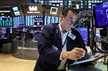 Wall Street aims to close a tumultuous week on a positive note.