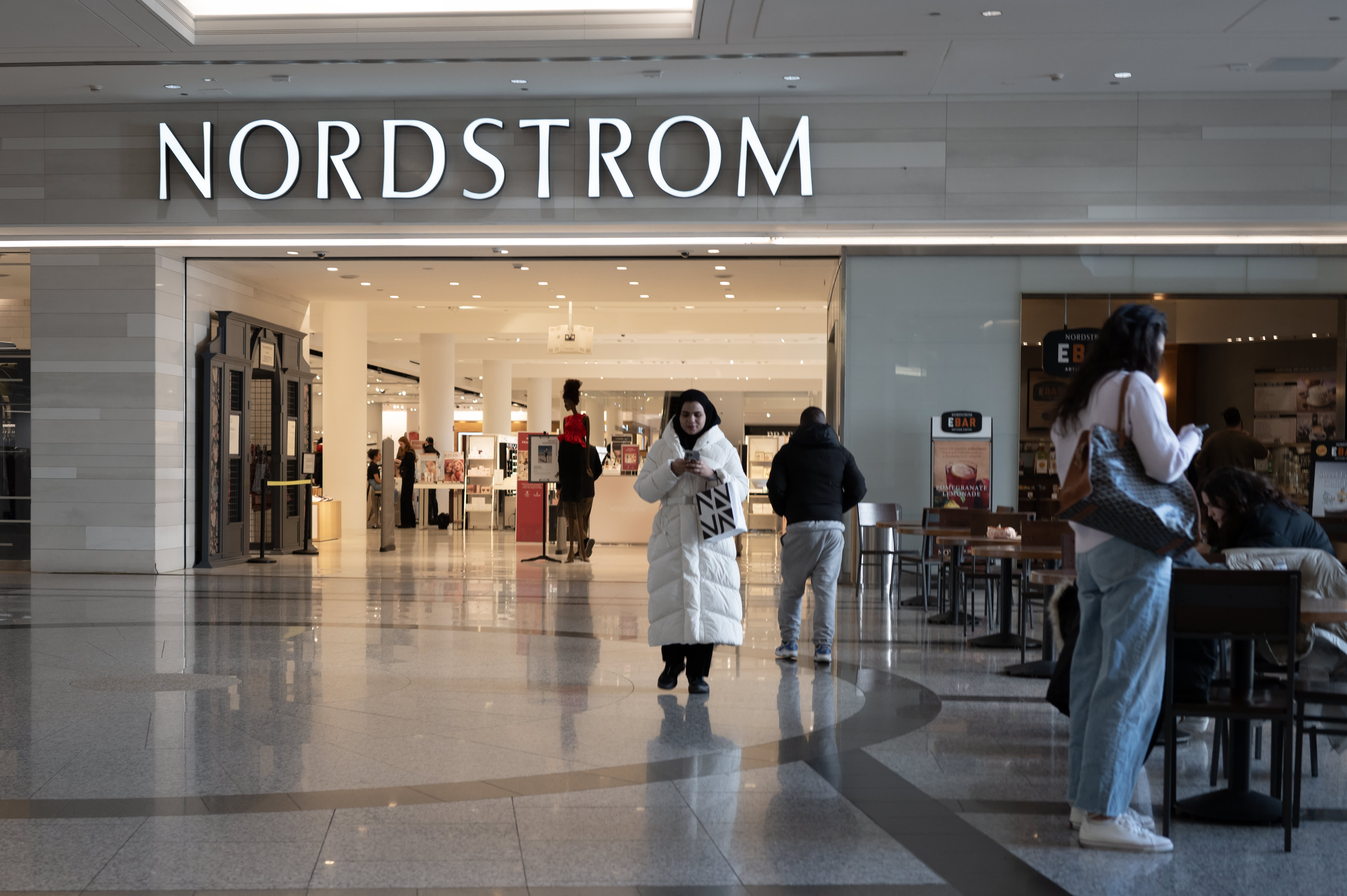 As shoppers buy more clothes and shoes, Nordstrom exceeds Wall Street's earnings expectations.