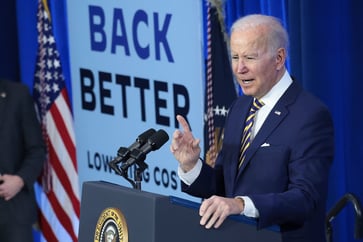 Biden urged to revive climate talks in stalled spending bill negotiations.