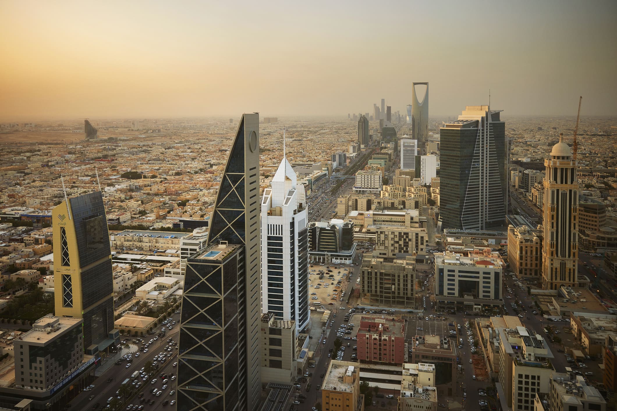 Saudi Arabia reduces growth projections and anticipates larger budget shortfalls.