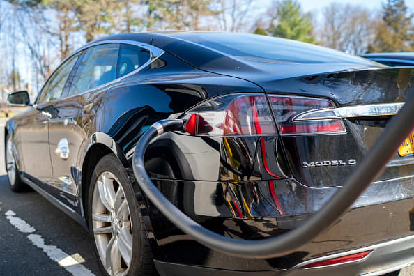 A green auto loan could make purchasing a Tesla or other electric vehicle more affordable.