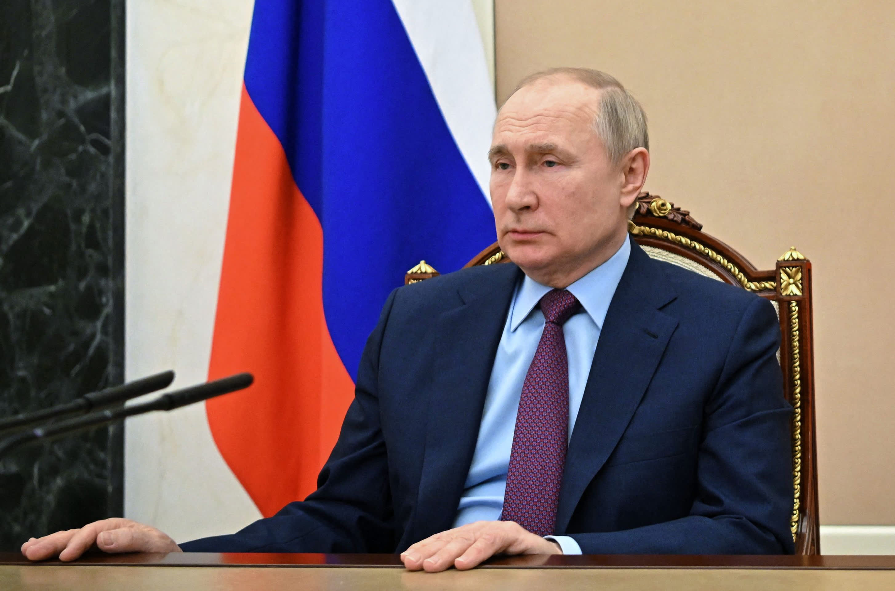 The Biden administration broadens penalties against Russia, prohibiting American dealings with its central bank.