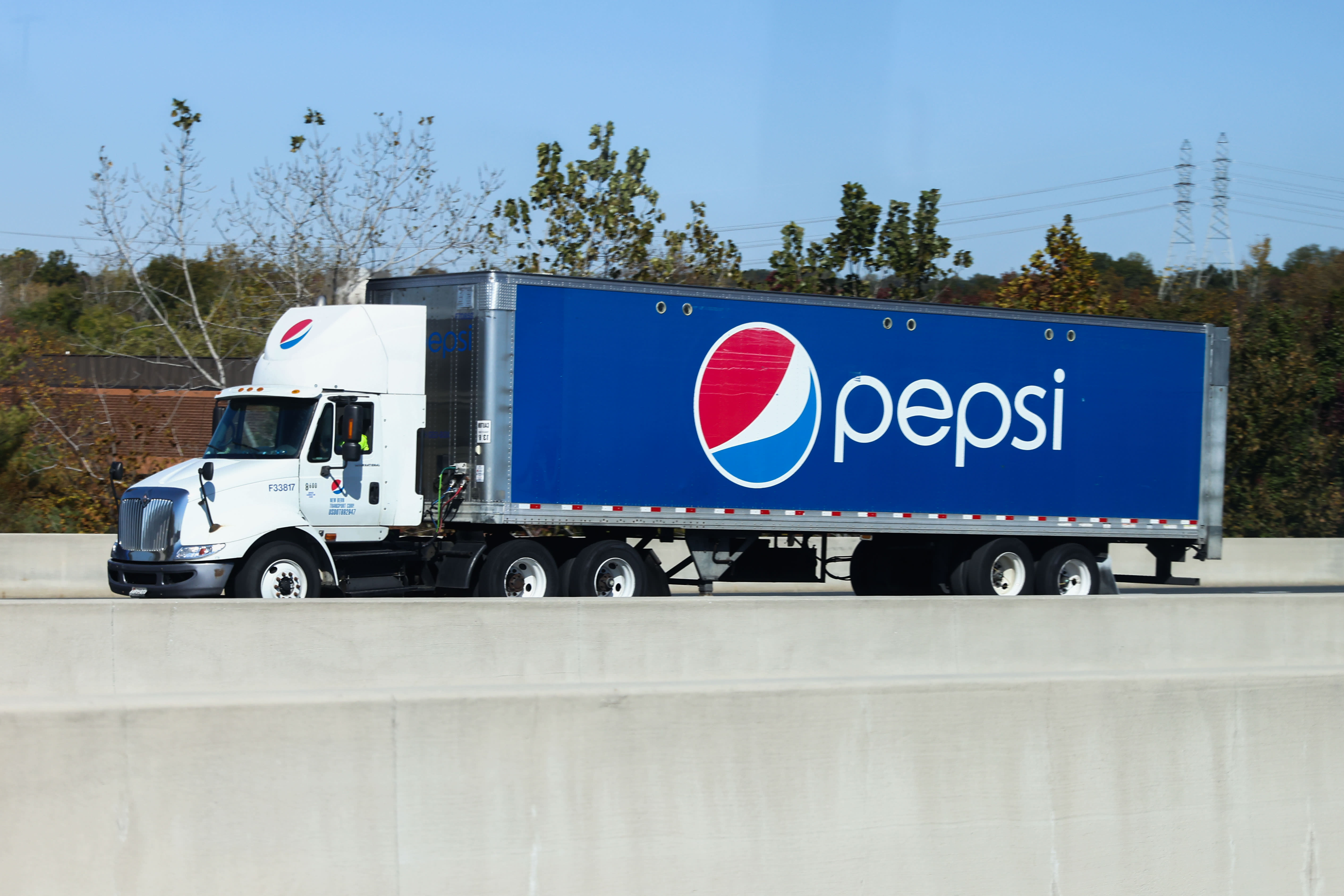 PepsiCo adjusts revenue forecast due to sluggish performance in North American snacking and international markets.