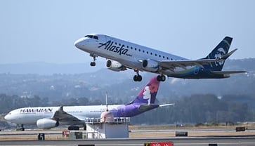 The merger between Alaska Airlines and Hawaiian Airlines has been approved by the Justice Department, but still needs to be reviewed by the Department of Transportation.