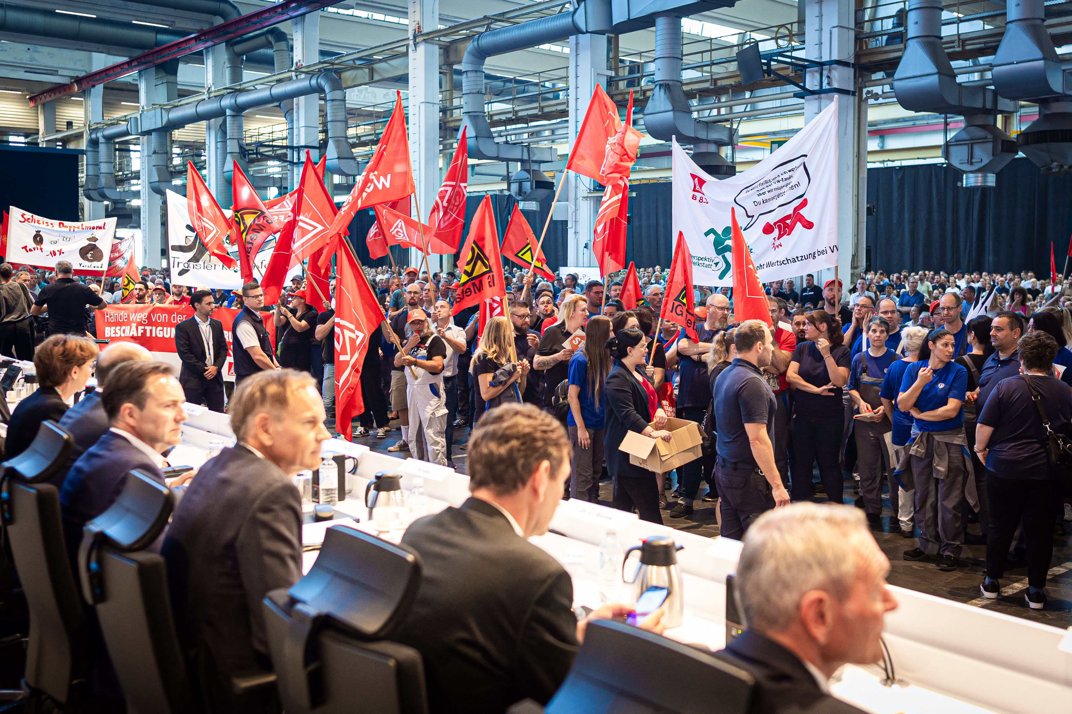 Possible German plant closures loom as unions protest Volkswagen's declaration of bankruptcy.