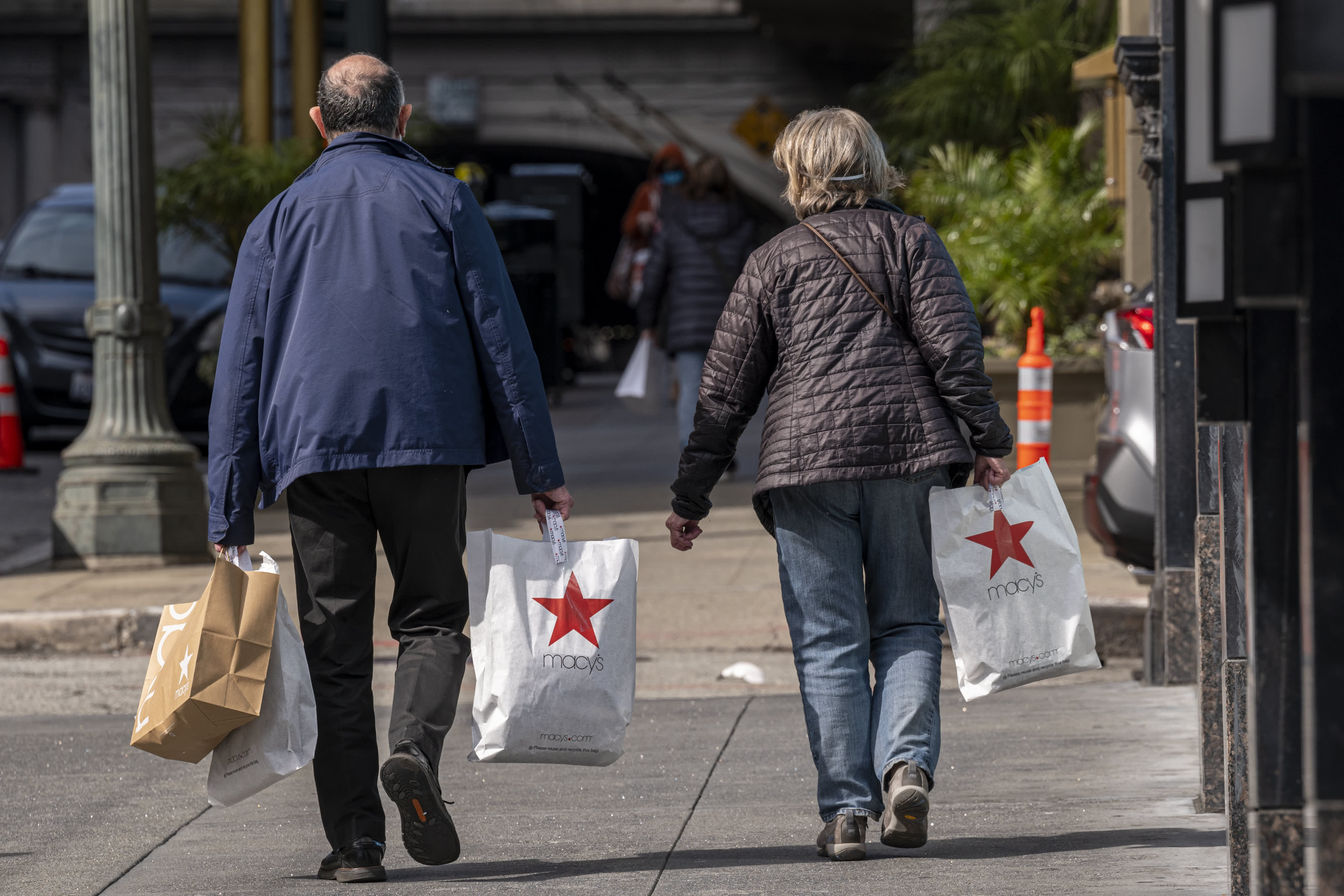 Macy's CFO predicts that lower-income shoppers may reduce spending in the near future, despite the overall health of the American consumer.