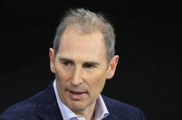 Amazon CEO Andy Jassy refutes claims that the 5-day office mandate is a disguised layoff.