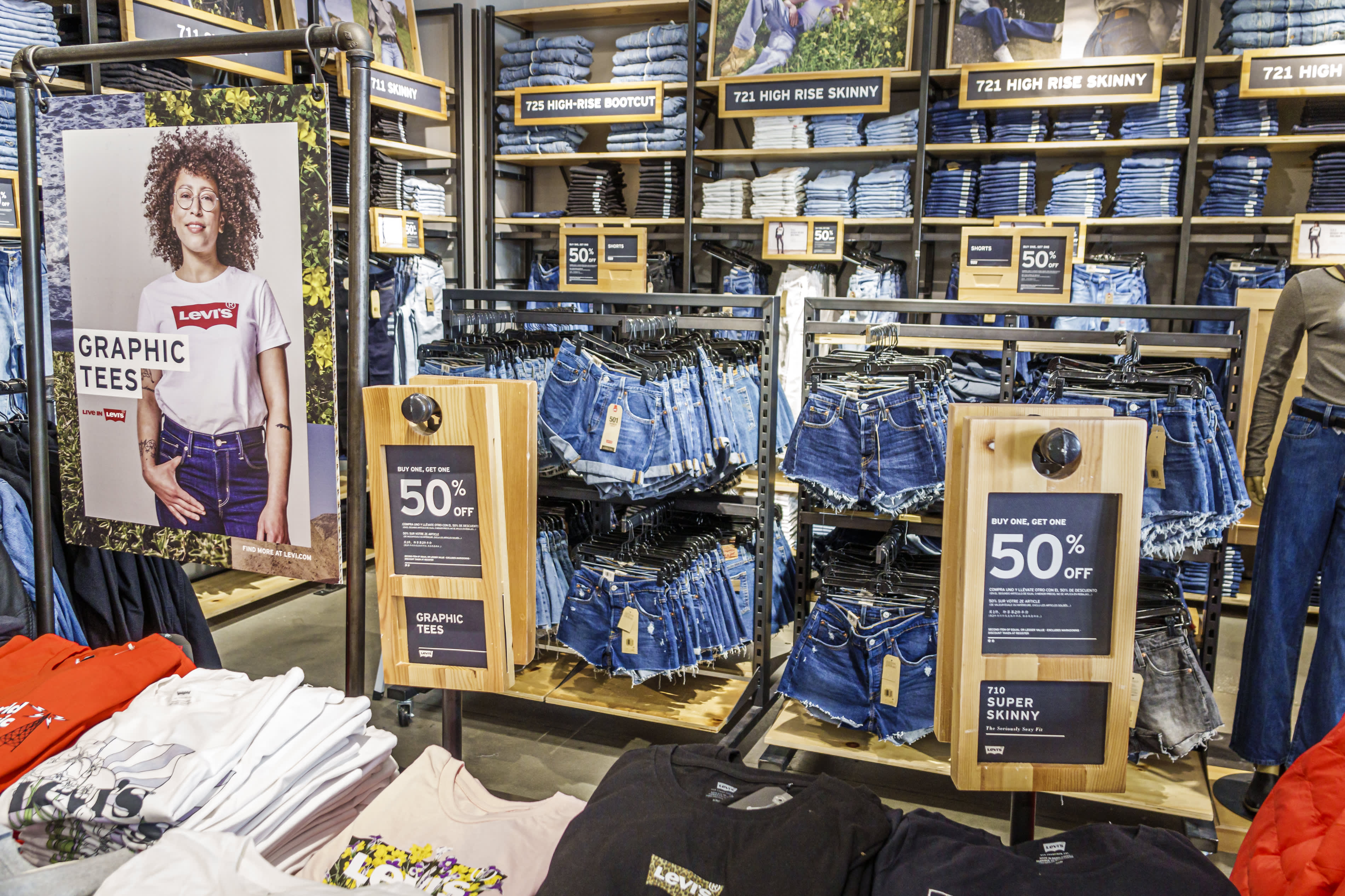 Sales of denim dresses and skirts surge due to Western clothing trend, Levi Strauss reports.