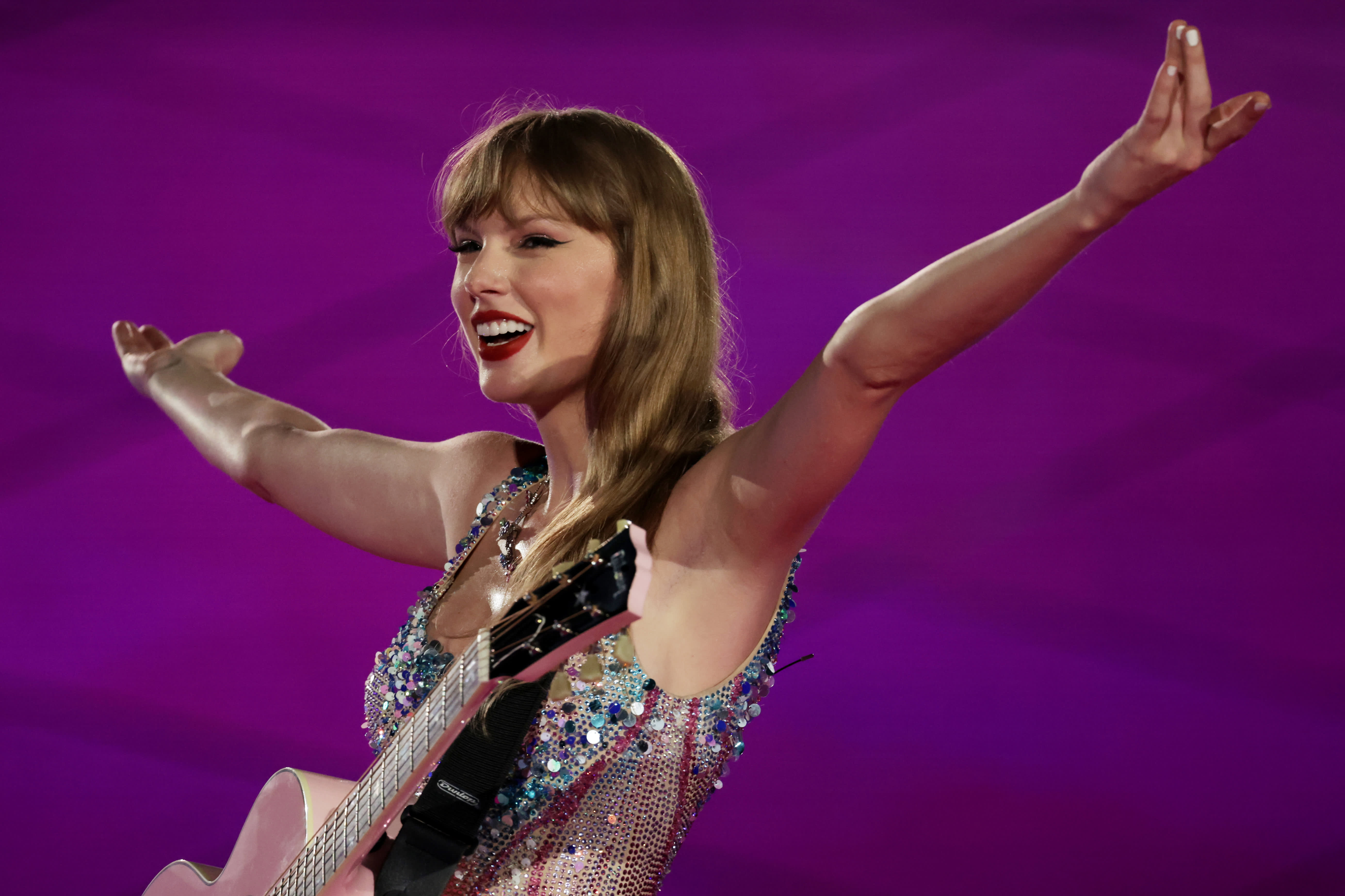 Singapore Prime Minister Lee Hsien Loong defends exclusive Taylor Swift deal, saying it's not hostile.