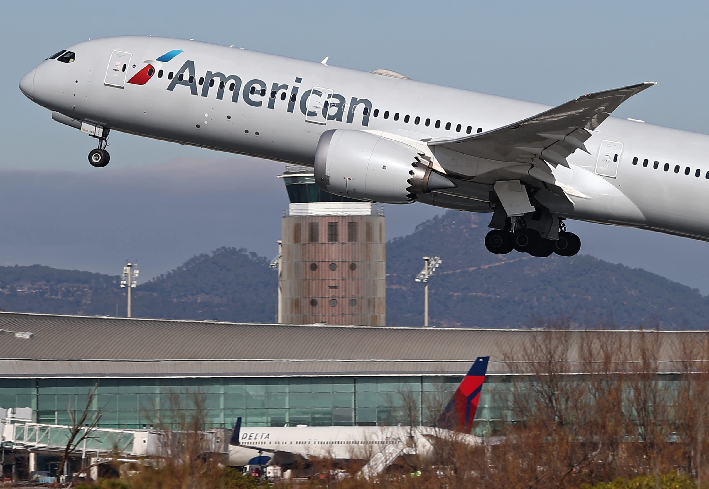 American Airlines' stock experiences a 10% increase due to robust demand, boosting its 2024 profit forecast.