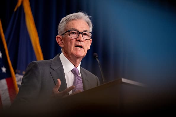 Powell hints at possible interest rate cuts: 'It's time for policy adjustment'