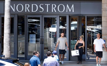 Nordstrom's stock price surges over 10% after news of private ownership attempt.