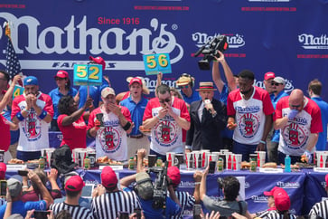 Bertoletti and Sudo win Nathan's hot dog contest after Chestnut's controversy.