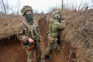 Pro-Russia rebels are accused of "provocation" by Ukraine after reports of shelling near the border.