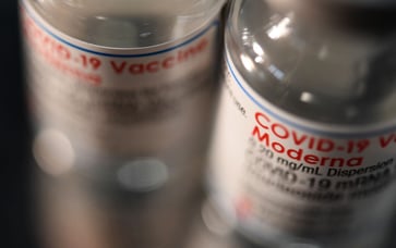 Moderna reports a surprise profit due to strong sales of Covid-19 vaccine, with cost-cutting measures being implemented.