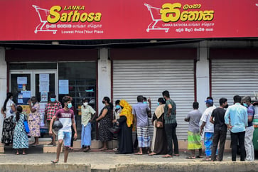 The economic crisis in Sri Lanka worsens as the country is overwhelmed by its heavy debt burden.