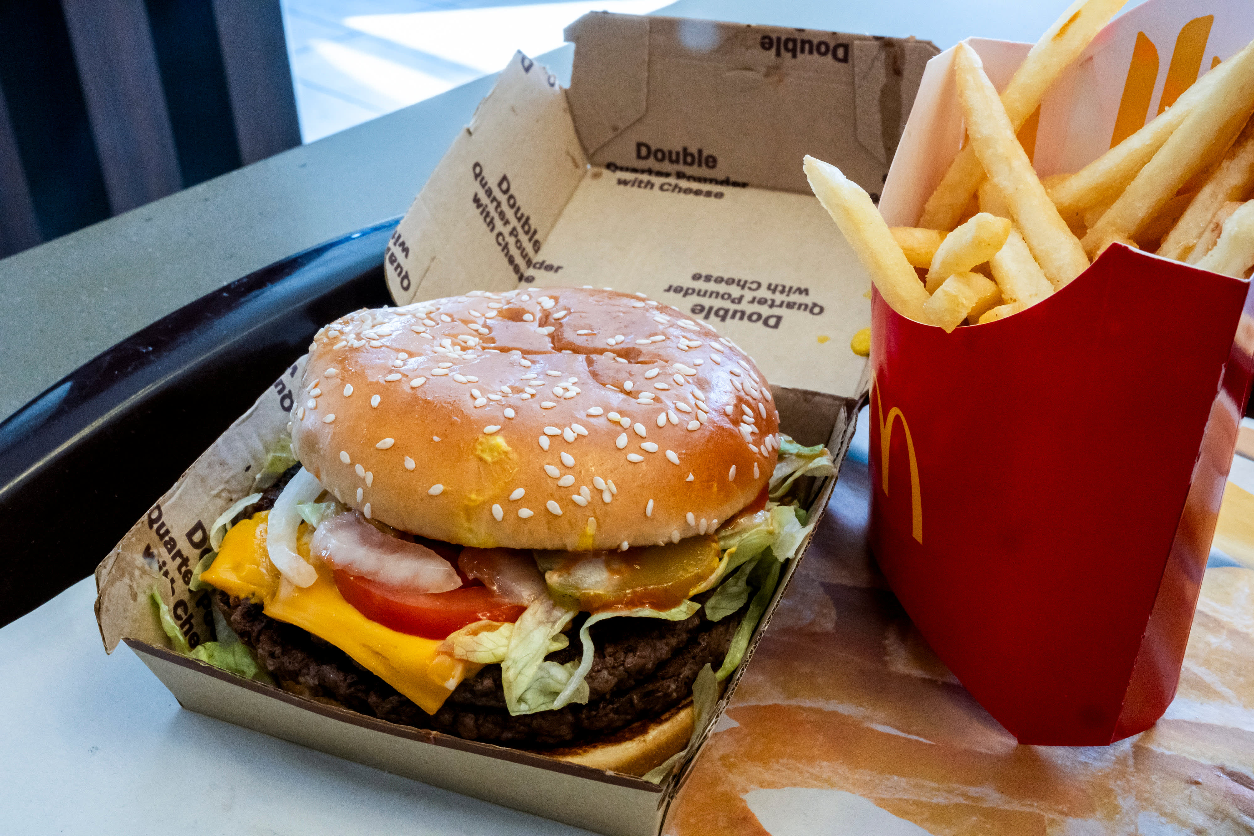 Quarter Pounder burgers to be reintroduced in restaurants affected by E. coli outbreak.