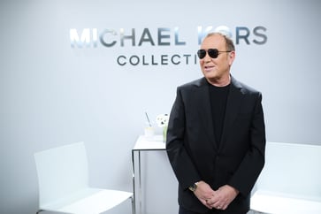 In a federal trial, Michael Kors testifies that selling handbags in the TikTok and Taylor Swift era is more challenging.