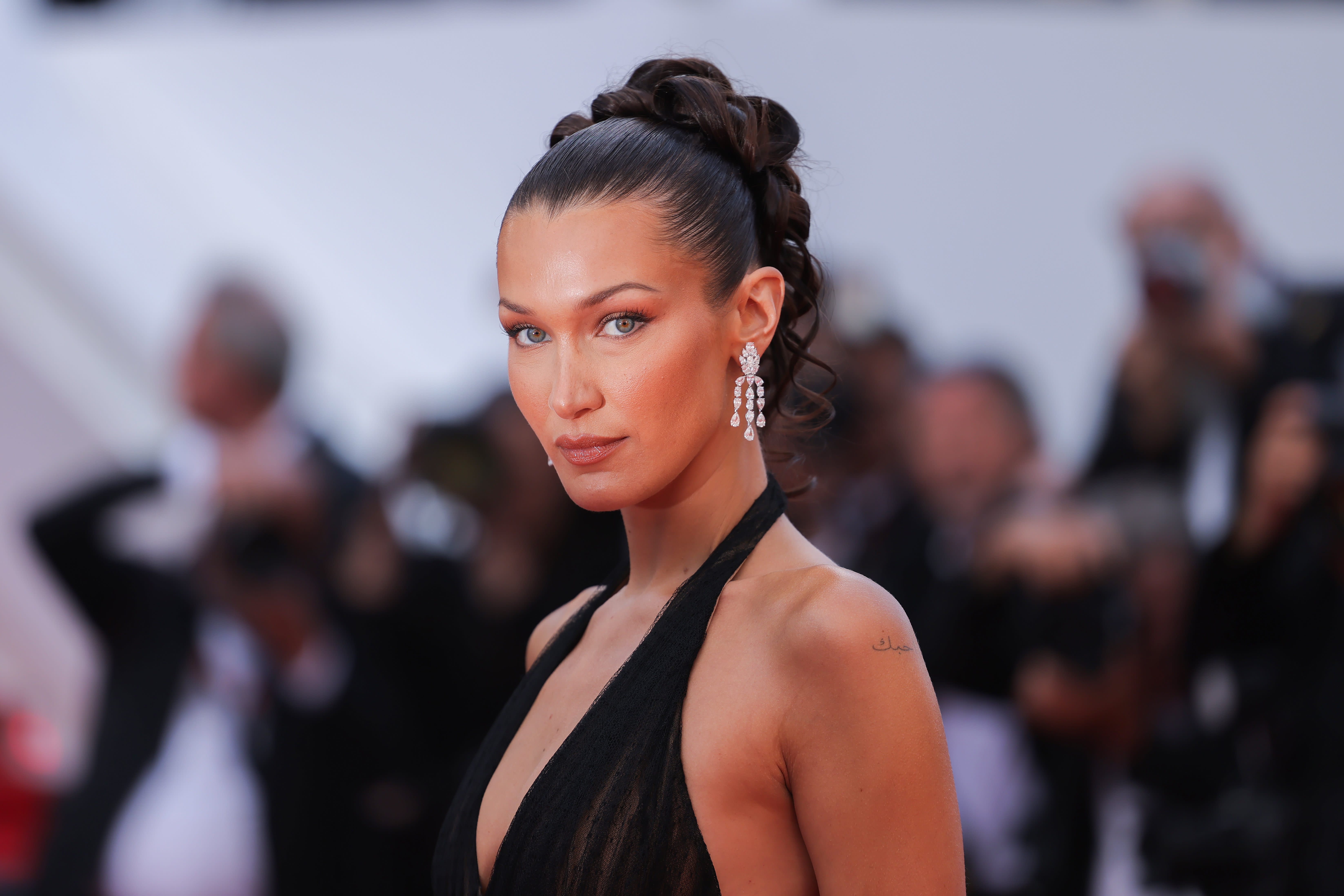 Bella Hadid expresses disbelief at the insensitivity displayed in Adidas' advertising campaign related to the 1972 Munich Olympics.