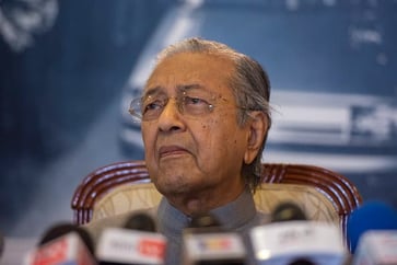 Mahathir denies any involvement in corrupt practices as former Malaysia Prime Minister.