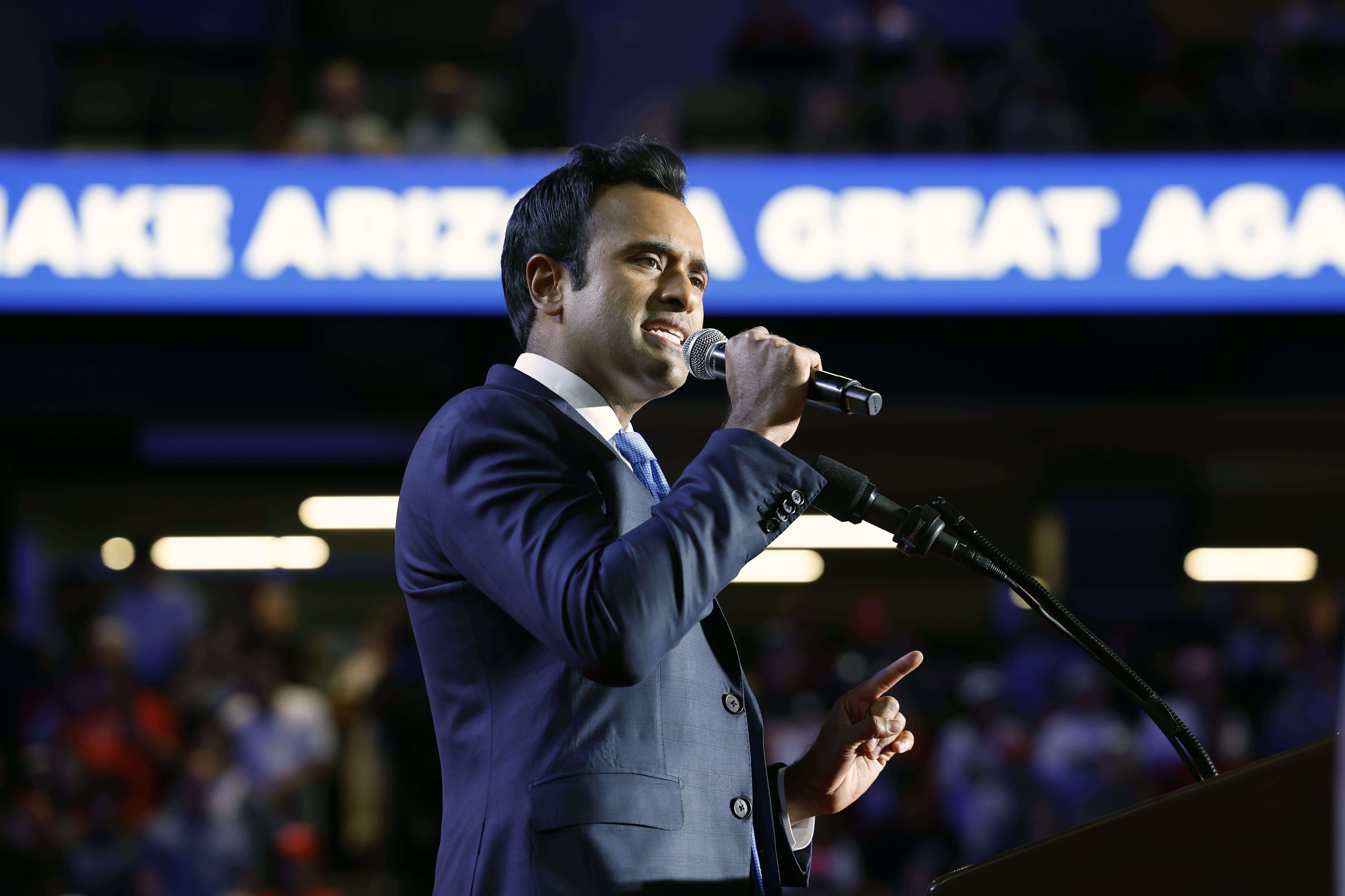 Biden's last-minute spending spree, including a loan to Rivian, is under scrutiny from Vivek Ramaswamy.