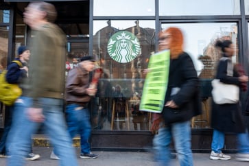 Union negotiations at Starbucks are set to resume as the company faces challenges in its stores.