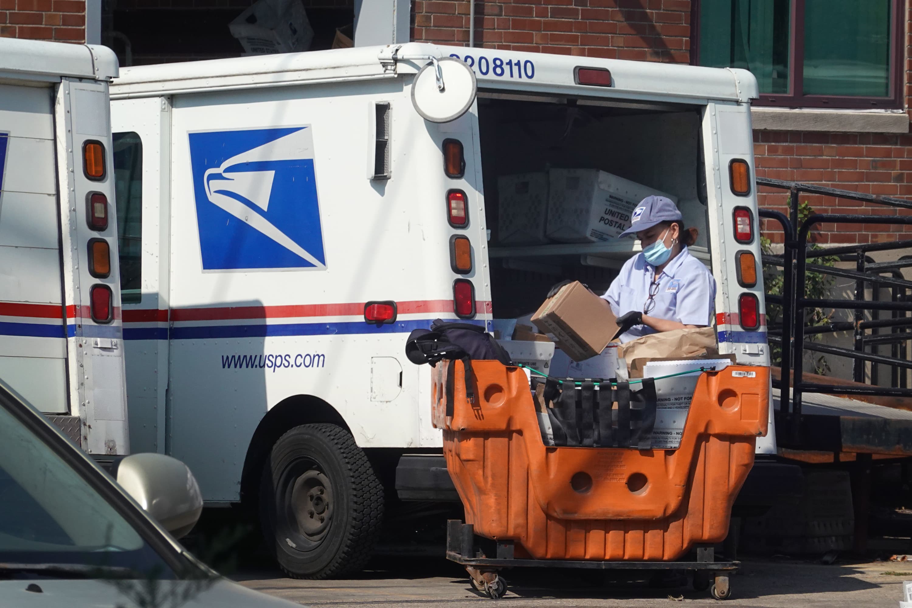 The Biden administration advises against the U.S. Postal Service's proposal to invest heavily in gas-powered vehicles.