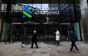 China's losses cause Standard Chartered's earnings to decline by 12%.