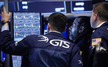 Investors raise rate hike expectations after Powell's comments, causing stocks to bounce.