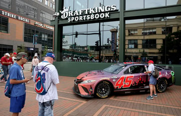 Jim Cramer is keeping a close eye on 22 stocks on Tuesday, including DraftKings and McDonald's.