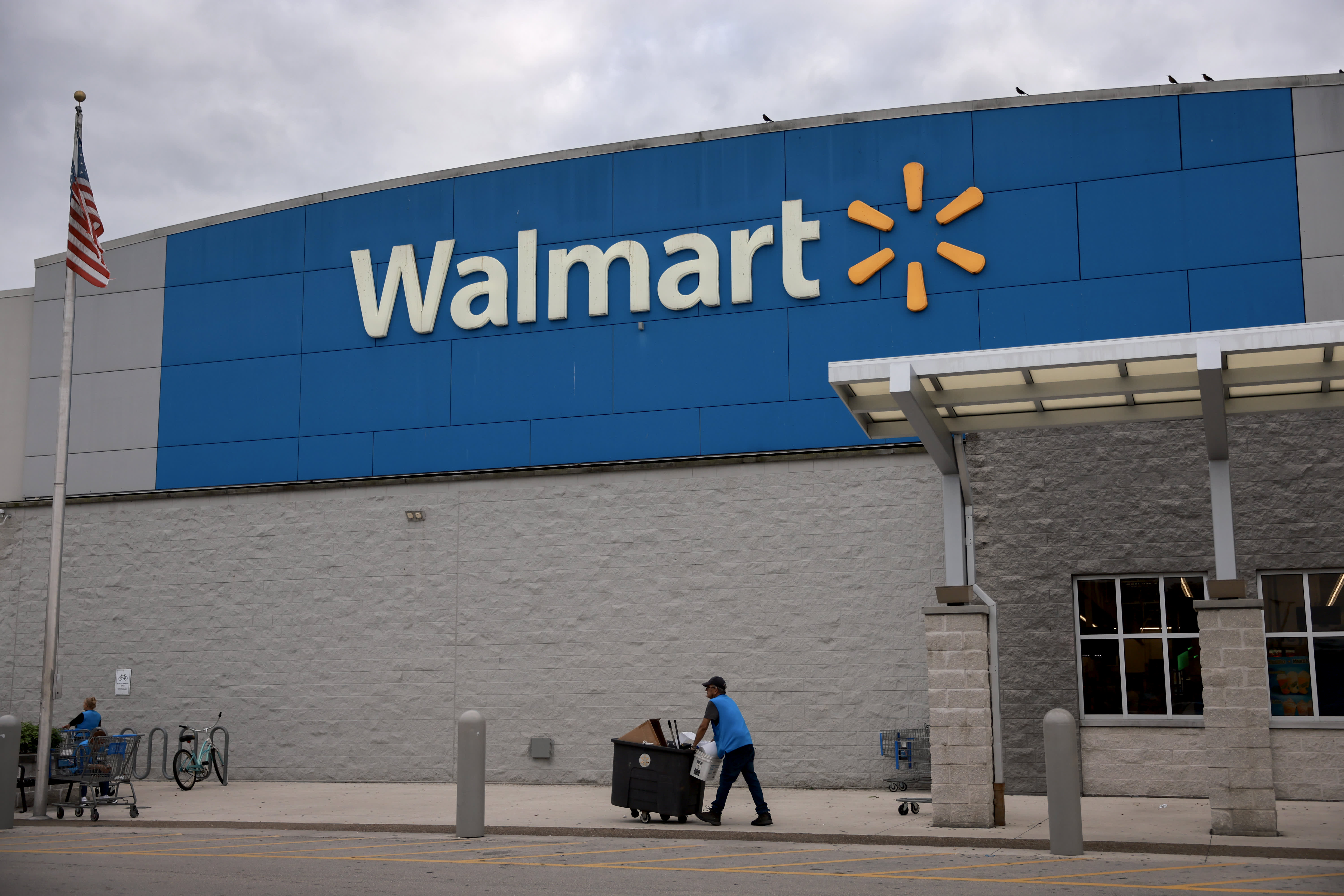 Walmart raises its forecast once more due to increased spending by customers beyond the grocery sections.