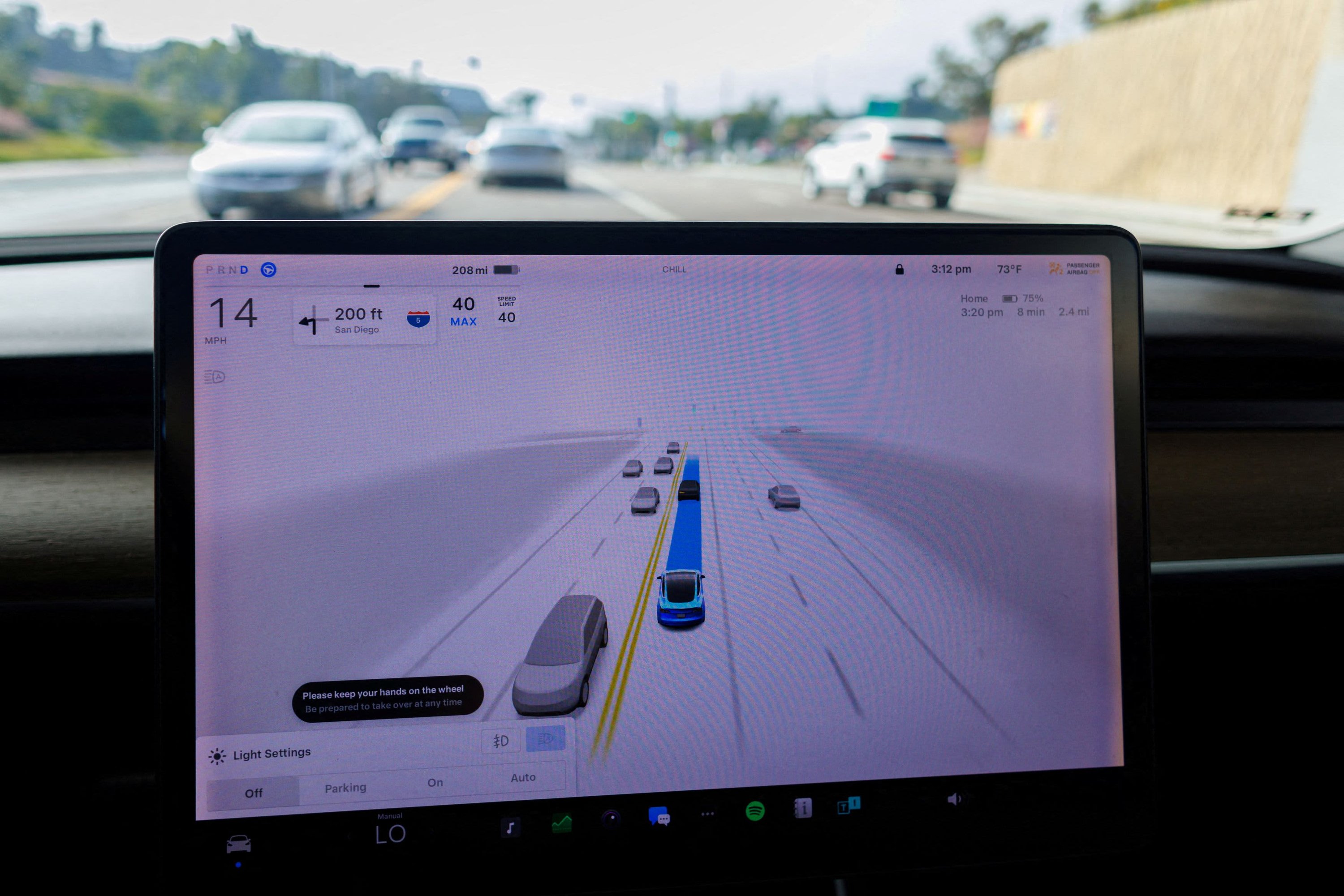 The NHTSA is investigating Tesla's 'Full Self-Driving' system following ...