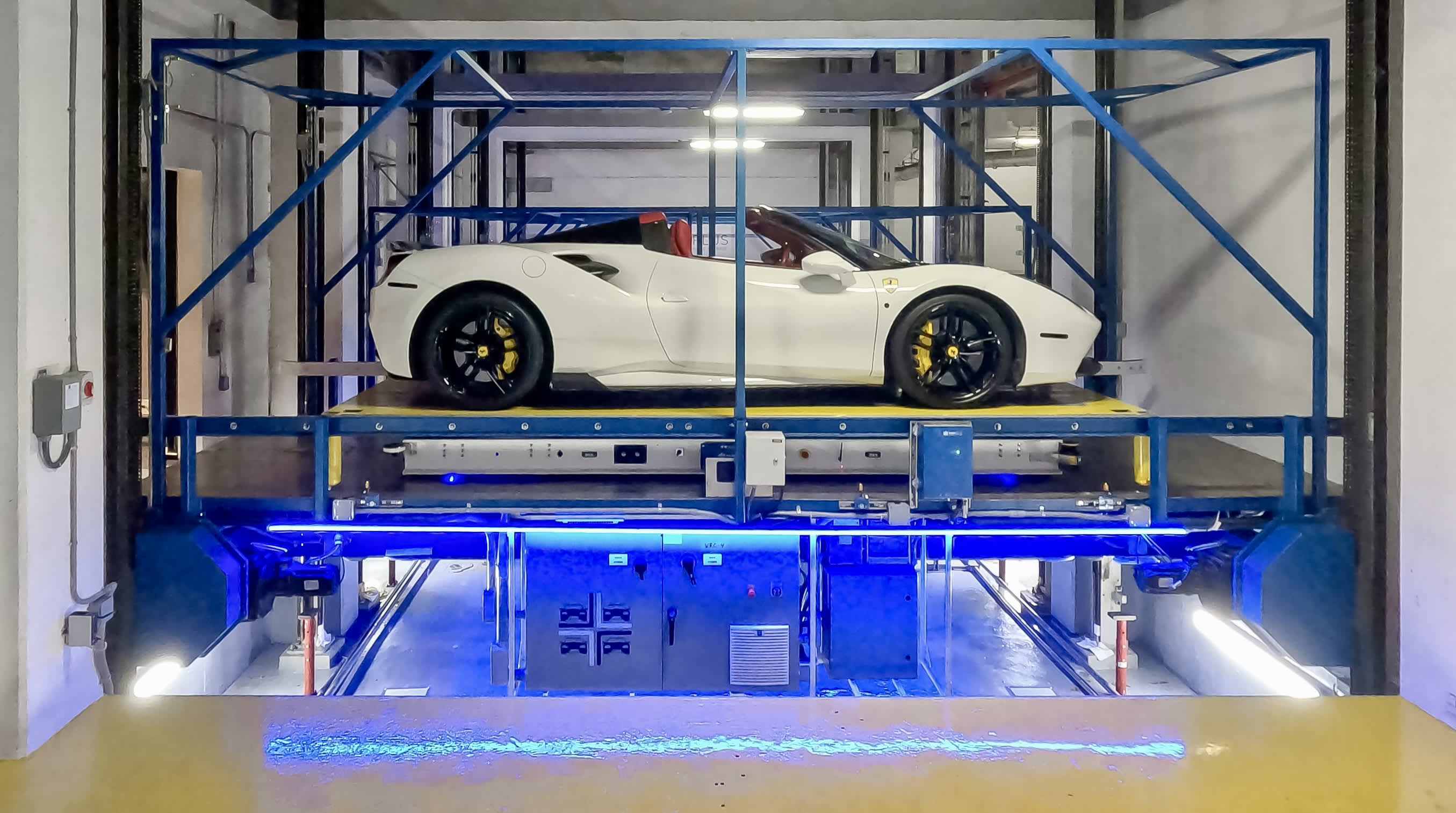 Your car is valet parked by robots in a high-tech parking garage.